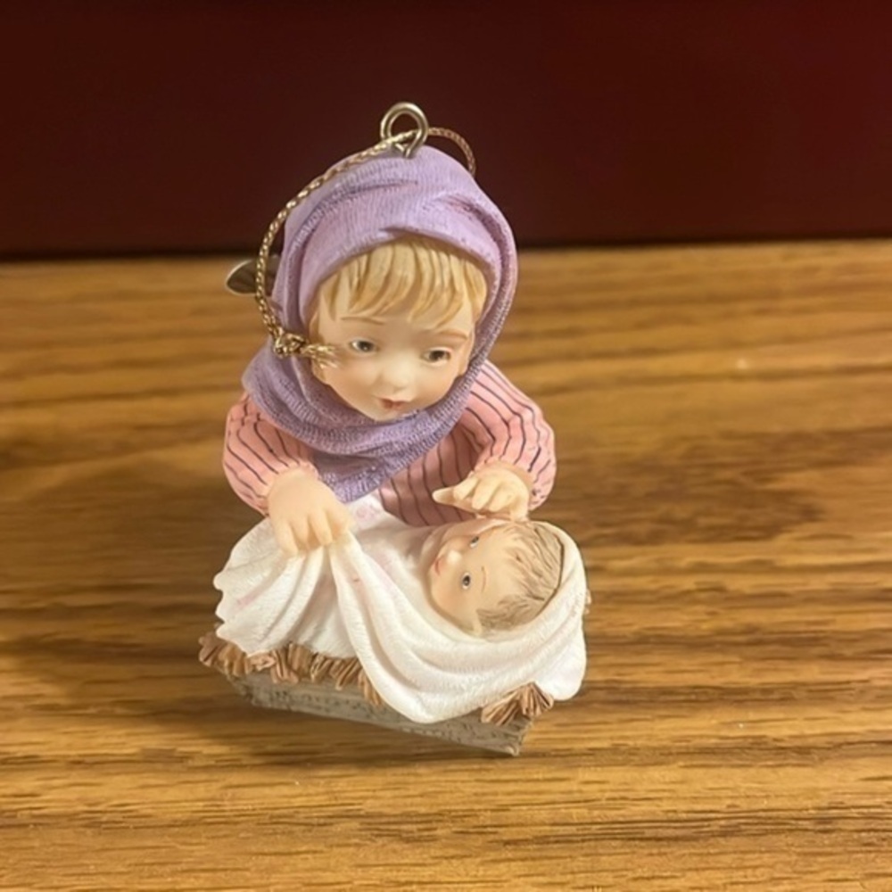 Heirloom ornament - And they found babe laying in a manger